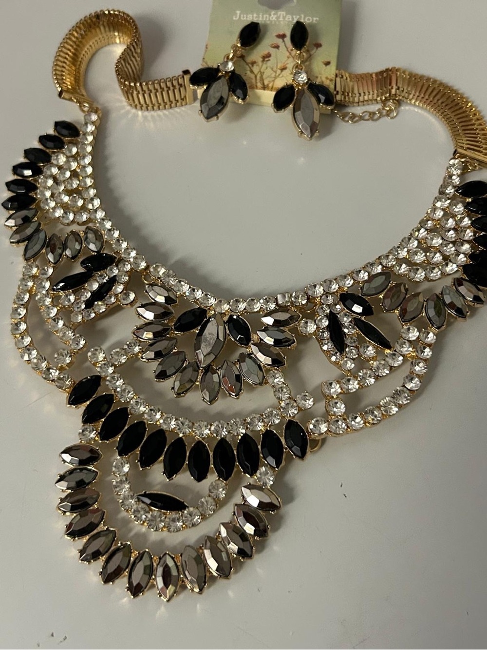 Just...Taylor Black and Gold Crystal Bib Necklace with Matching Earrings
